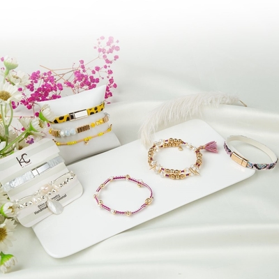 De vlakke Reeksen van Greephematiet Geparelde Armbanden 1mm koord van de zijdejaspis