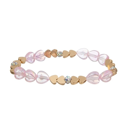Roze Meisjes Elegante Sierlijke Geparelde die Armband met Gouden Harttegenhanger wordt geplaatst